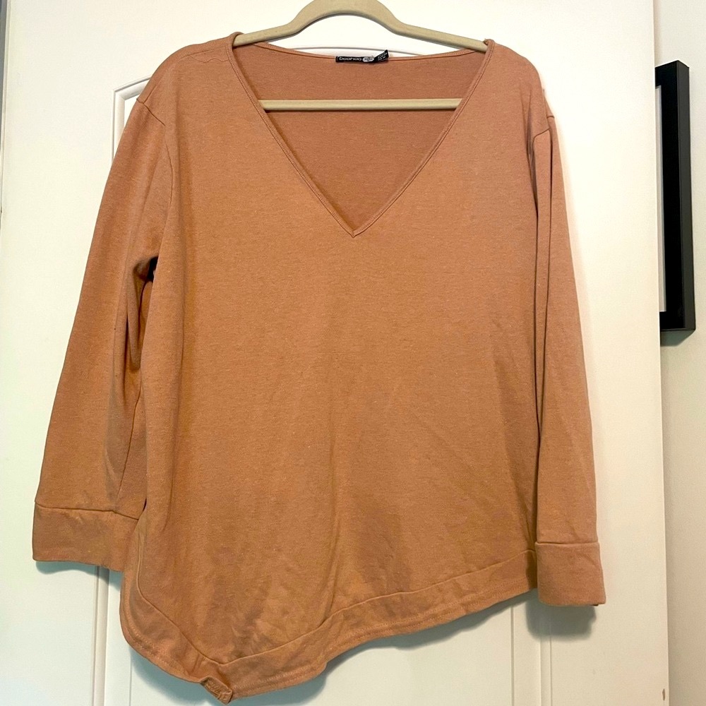 Asymmetrical long sleeved top size 18